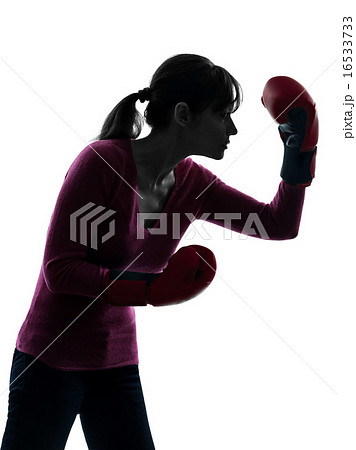mature woman with boxing gloves silhouette 16533733