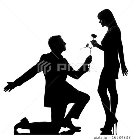 one couple man kneeling offering rose flower and woman smiling s one couple man kneeling offering rose flower and woman smiling s 16534338