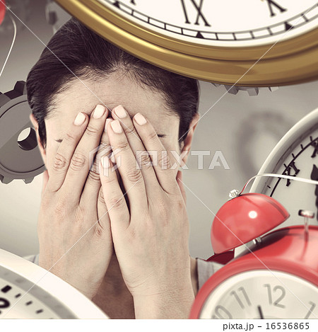 Composite image of sad woman hiding her face Composite image of sad woman hiding her face 16536865