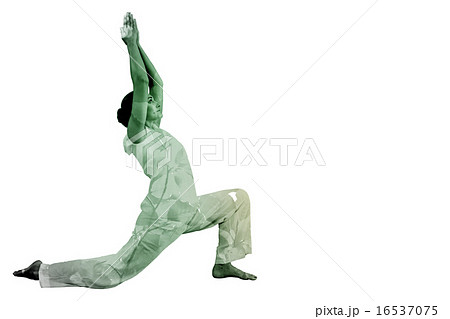 Composite image of content brunette in white doing tai chi 16537075