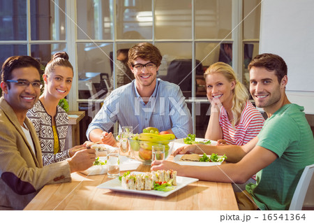 Business people having lunch 16541364