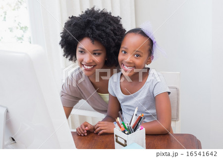Happy family using the computer Happy family using the computer 16541642