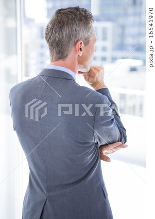 Thinking businessman in the office Thinking businessman in the office 16541970