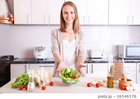 smiling woman making healthy food 16546576
