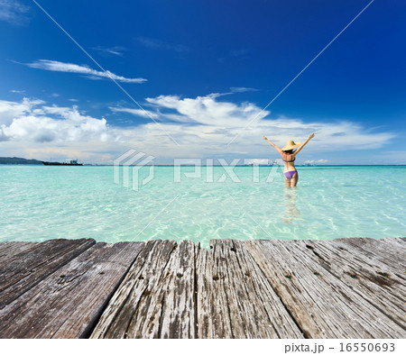 Girl on a beach Girl on a beach 16550693