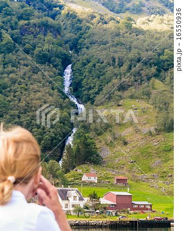Tourism. Woman traveller on ship, fjord in Norway. Tourism. Woman traveller on ship, fjord in Norway. 16550936