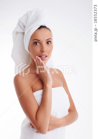 Attractive young woman is expressing surprise after shower Attractive young woman is expressing surprise after shower 16552373