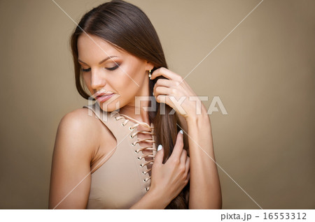 Beautiful young healthy woman is very shy Beautiful young healthy woman is very shy 16553312