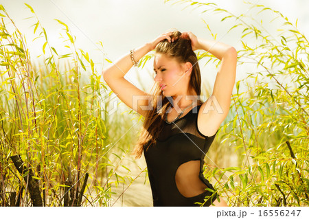 Beautiful sexy girl in swimwear on beach. 16556247