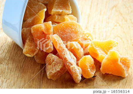 Closeup candied dried ginger in white bowl 16556314