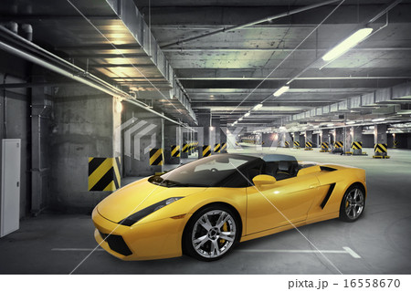 Sports car parked in basement carpark 16558670