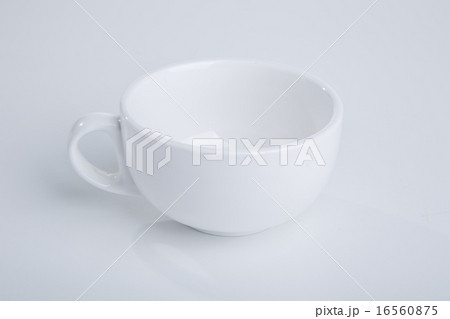 empty white tea cup empty white tea cup 16560875