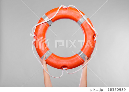 Life buoy ring in female hands Life buoy ring in female hands 16570989