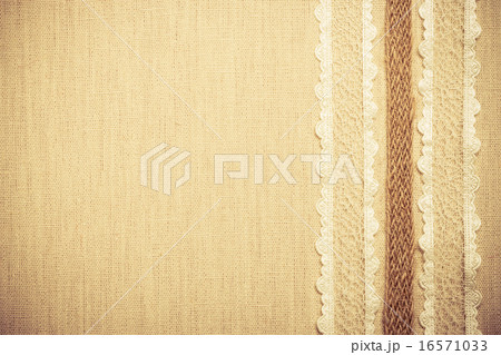 Lace frame on linen cloth background 16571033