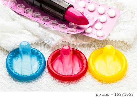 Pills condoms and lipstick on lace lingerie Pills condoms and lipstick on lace lingerie 16571055