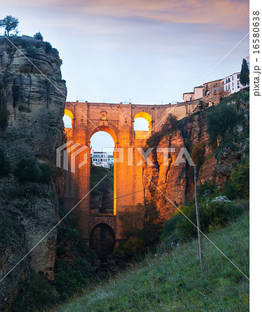 Ancient stone bridge in twilight. Ronda 16580638
