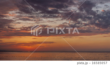 beautiful sunset at the beach beautiful sunset at the beach 16585057