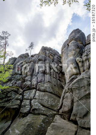 Male climber climbing rock Male climber climbing rock 16587320