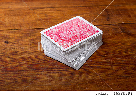 deck of cards on wooden table deck of cards on wooden table 16589592