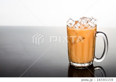 Refreshing ice cold tea in transparent glass Refreshing ice cold tea in transparent glass 16593159