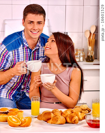 Couple breakfast at kitchen. 16601529