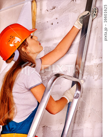 Woman in builder uniform. 16601625
