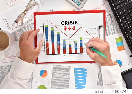 businessman drawing crisis chart businessman drawing crisis chart 16608742