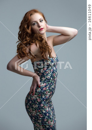 Pretty freckled model posing in skin-tight dress Pretty freckled model posing in skin-tight dress 16611049