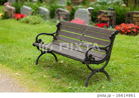 Empty old wooden bench in cemetery Empty old wooden bench in cemetery 16614861