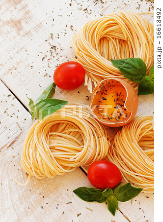 raw egg and noodles with spices raw egg and noodles with spices 16618492