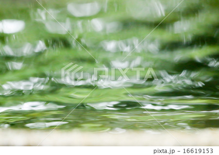 blurred Rain on water 16619153