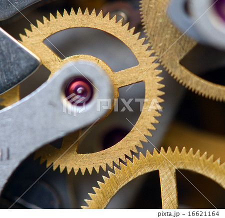 Background with metal cogwheels a clockwork. macro Background with metal cogwheels a clockwork. macro 16621164