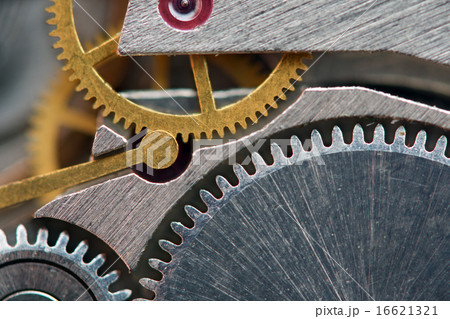 Background with metal cogwheels a clockwork. Macro 16621321