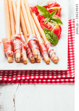 Grissini with prosciutto Grissini with prosciutto 16624645