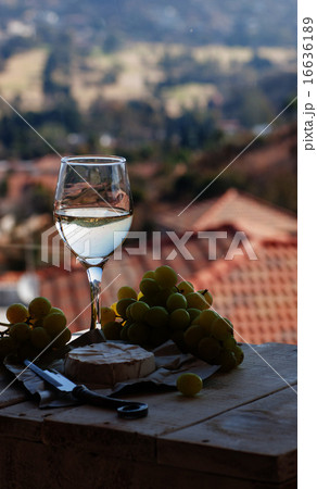 glass wine on a background of mountains glass wine on a background of mountains 16636189
