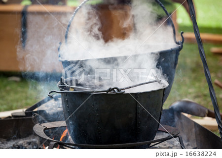 Soup cooking in medieval pot Soup cooking in medieval pot 16638224