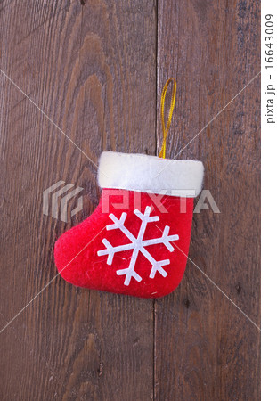 red sock on wooden board 16643009
