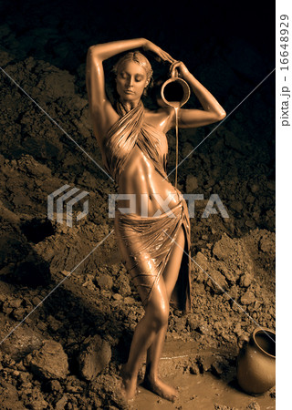 Beautiful young woman smeared with clay Beautiful young woman smeared with clay 16648929