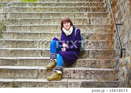 Beautiful young tourist in Paris 16658673