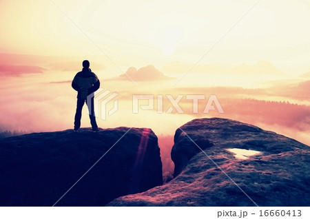 Moment of loneliness. Man n rocky mountains Moment of loneliness. Man n rocky mountains 16660413