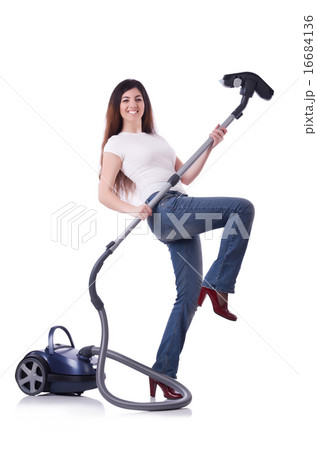Young woman with vacuum cleaner on white 16684136