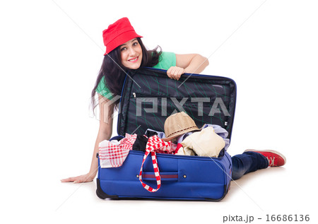 Young girl packing for vacation 16686136