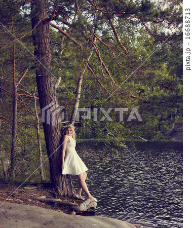 Attractive woman on the lake Attractive woman on the lake 16688713