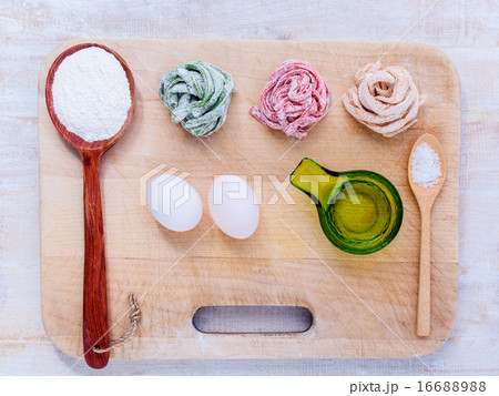 Preparation homemade pasta on wooden table. 16688988