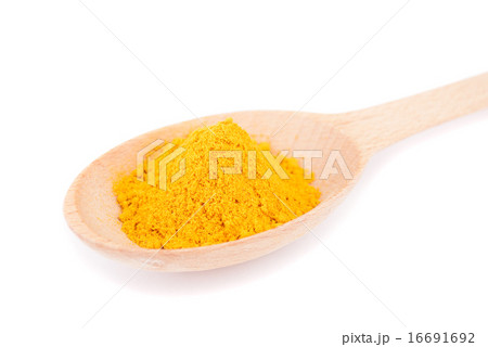 Turmeric in spoon close-up. 16691692