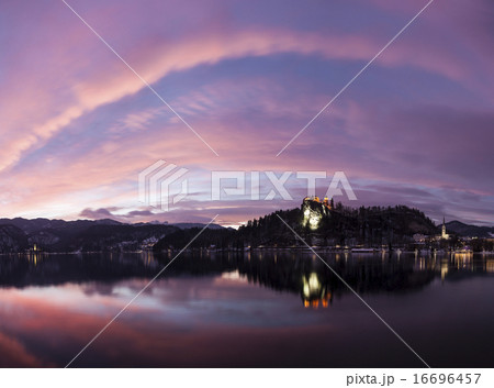 Clouds over Lake Bled and illuminated Church of the Assumption Clouds over Lake Bled and illuminated Church of the Assumption 16696457