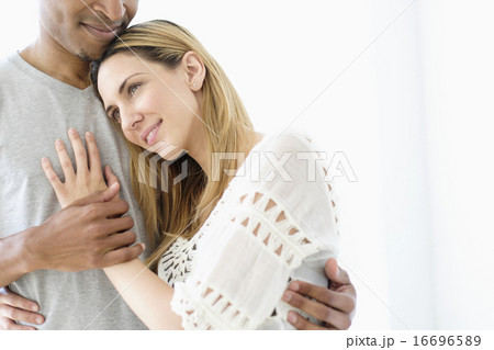 Mid adult couple embracing 16696589