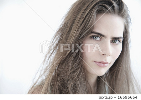 Portrait of young woman with blue eyes Portrait of young woman with blue eyes 16696664