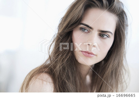 Portrait of young woman with blue eyes 16696665