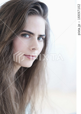 Portrait of young woman with blue eyes 16697102